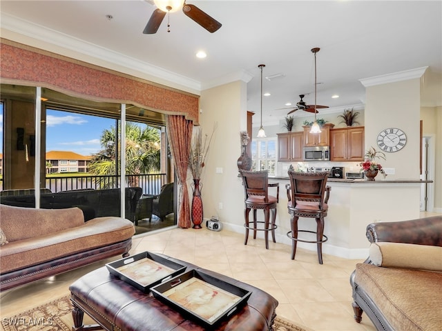 tiled living room with ornamental molding and ceiling fan