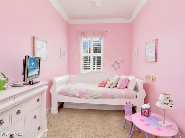 bedroom with crown molding, ceiling fan, and light colored carpet