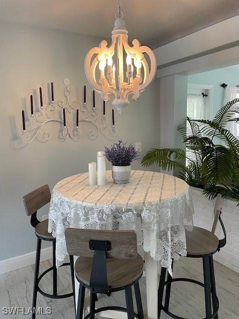 dining room featuring a chandelier