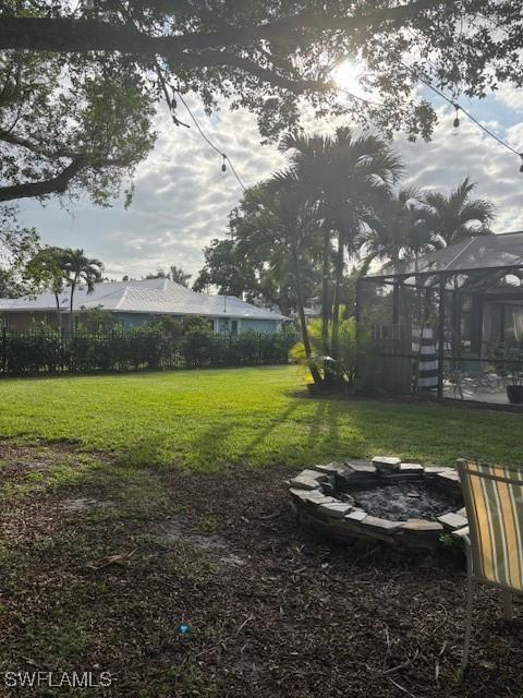 view of yard featuring a fire pit