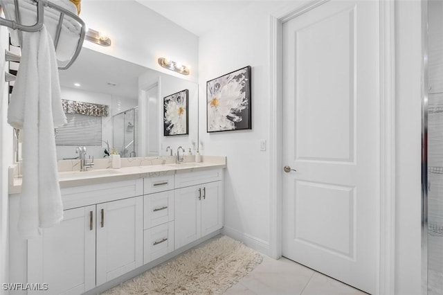 bathroom with vanity and walk in shower