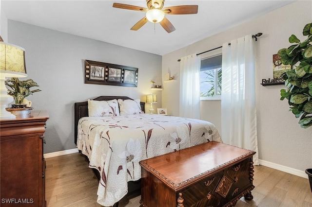 7417 S Blue Sage, Punta Gorda, FL 33955 - bedroom with wood finished floors, baseboards, and a ceiling fan