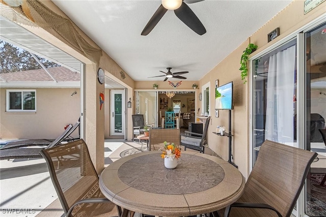 view of patio / terrace featuring ceiling fan