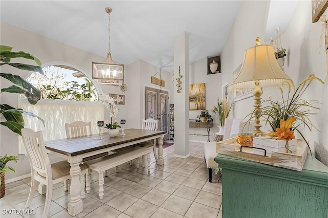 7417 S Blue Sage, Punta Gorda, FL 33955 - dining area featuring a chandelier, lofted ceiling, and light tile patterned flooring