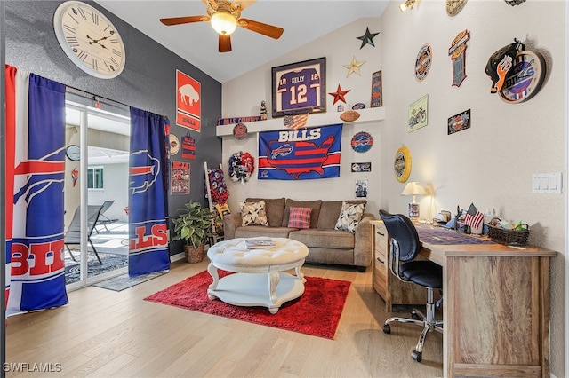 office featuring ceiling fan, hardwood / wood-style floors, and vaulted ceiling