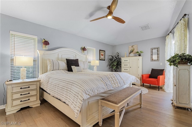 bedroom featuring dark hardwood / wood-style floors and ceiling fan