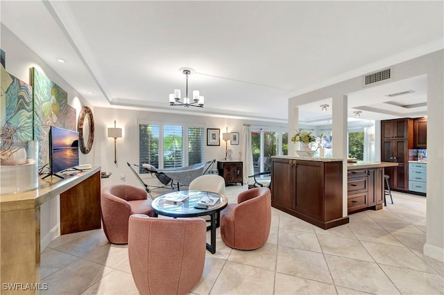 tiled living room with a raised ceiling and a notable chandelier