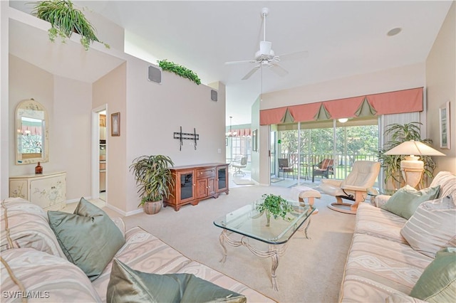 carpeted living room featuring ceiling fan