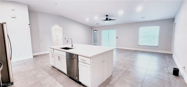 kitchen featuring stainless steel appliances, ceiling fan, a kitchen island with sink, sink, and white cabinetry