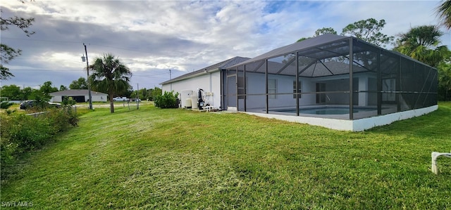 view of yard featuring a lanai