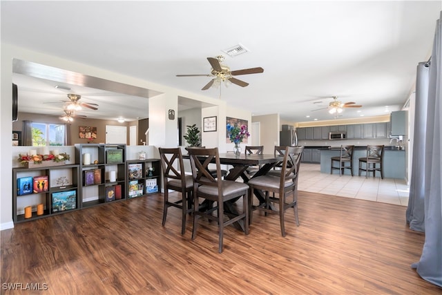 dining room with light wood-type flooring