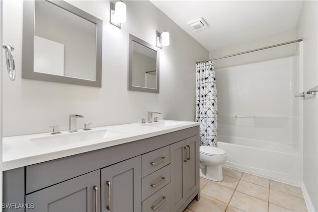 full bathroom with vanity, toilet, tile patterned floors, and shower / bathtub combination with curtain