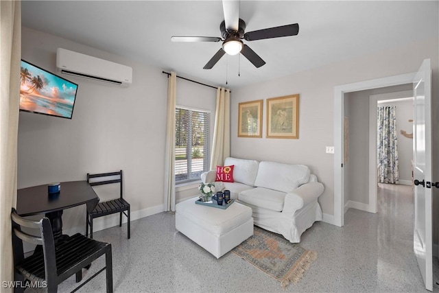 living room featuring ceiling fan and a wall mounted AC