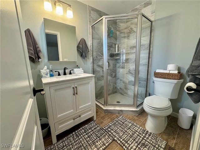 159 Pearl St, Fort Myers Beach, FL 33931 - bathroom with a shower stall, vanity, and toilet