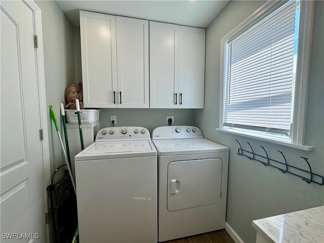 159 Pearl St, Fort Myers Beach, FL 33931 - laundry room with washing machine and clothes dryer, baseboards, dark wood-style floors, and cabinet space