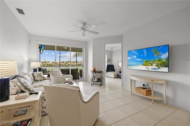 living room with light tile patterned floors and ceiling fan