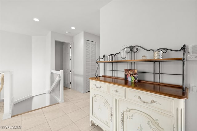 kitchen with light tile patterned floors