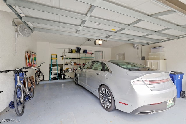 garage featuring a garage door opener