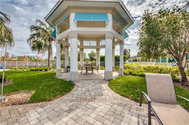 exterior space featuring a lawn and a patio