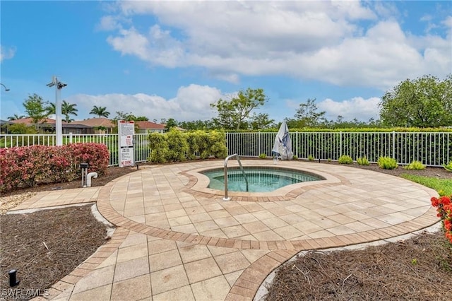 view of pool featuring a community hot tub