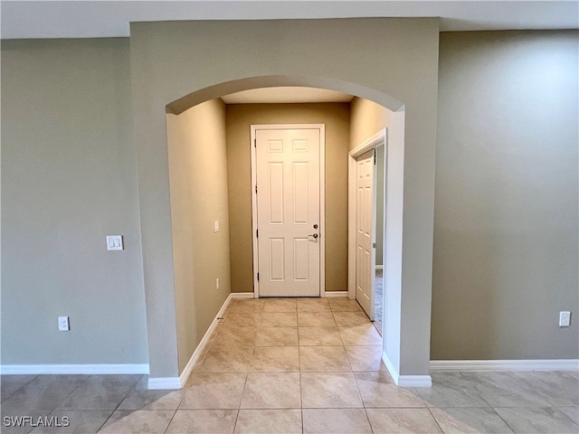 interior space featuring light tile patterned floors