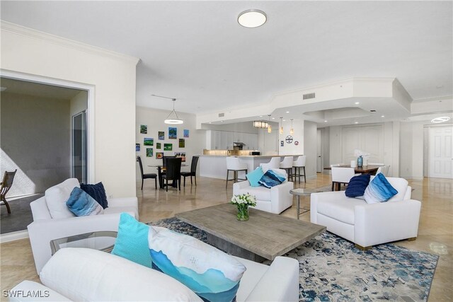 living room with crown molding