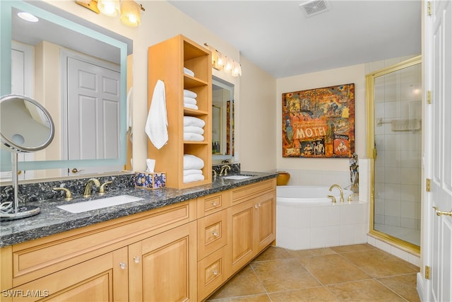 full bath featuring a stall shower, visible vents, and a sink