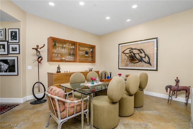 dining area featuring recessed lighting and baseboards