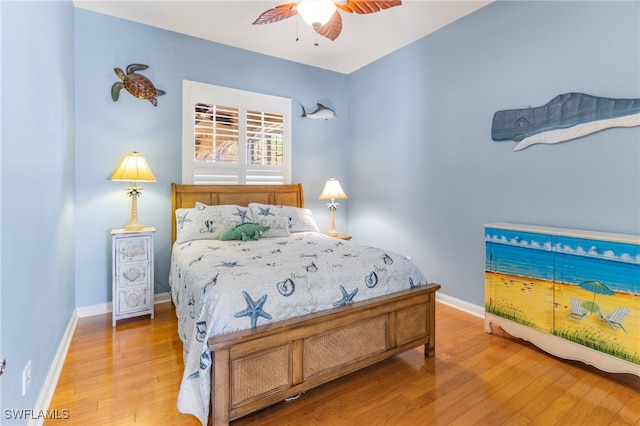 bedroom featuring ceiling fan and hardwood / wood-style floors