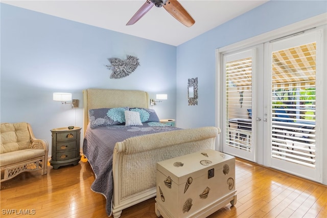 bedroom with french doors, ceiling fan, hardwood / wood-style flooring, and access to exterior