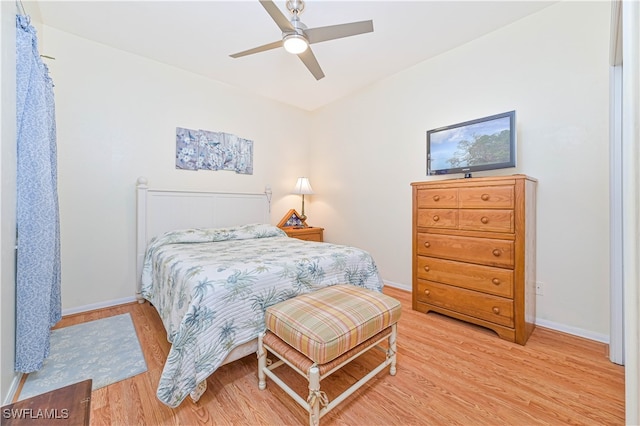 bedroom featuring ceiling fan and hardwood / wood-style floors