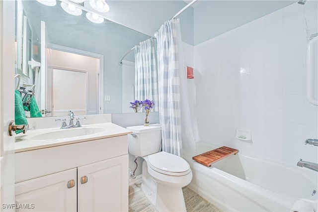 full bathroom featuring vanity, toilet, and shower / bath combo with shower curtain