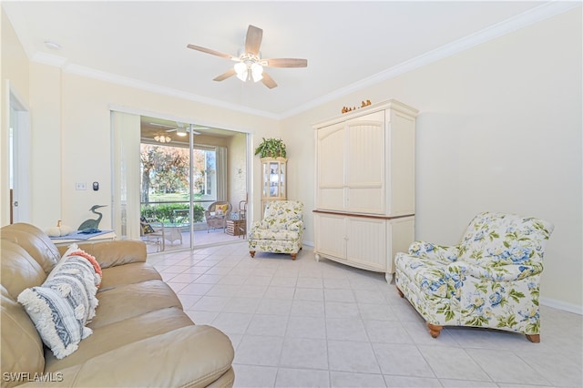 living room with ornamental molding, light tile patterned floors, and ceiling fan