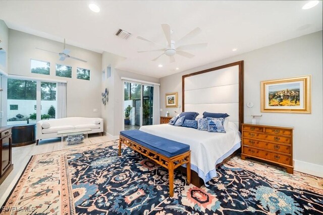 bedroom with light hardwood / wood-style floors, access to exterior, and ceiling fan