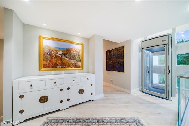 hall featuring light hardwood / wood-style flooring