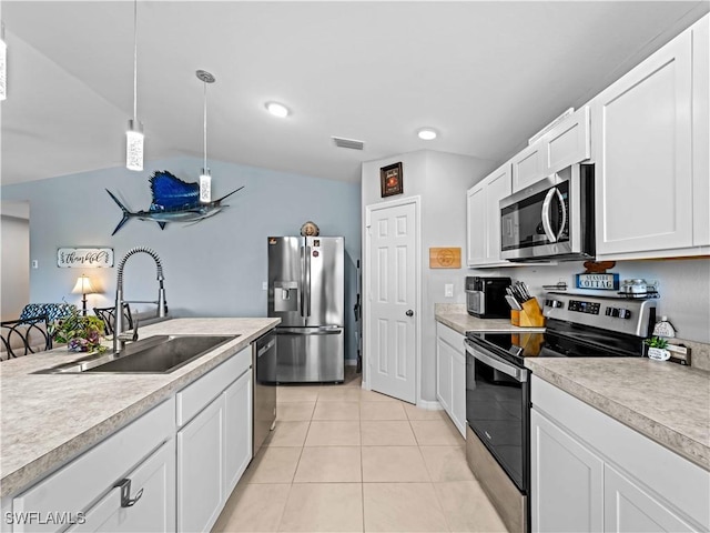 917 NW 13th Ave, Cape Coral, FL 33993 - kitchen featuring a sink, white cabinetry, visible vents, light countertops, and appliances with stainless steel finishes