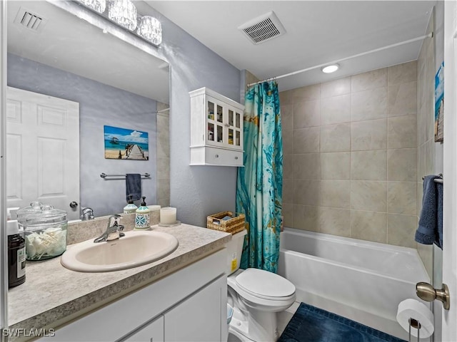 full bathroom with vanity, toilet, and shower / bath combo with shower curtain