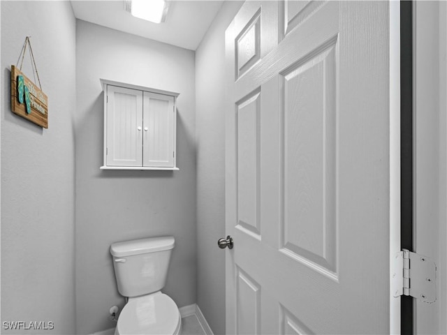 bathroom featuring toilet