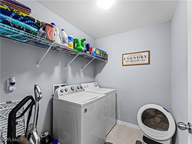 clothes washing area featuring washing machine and dryer