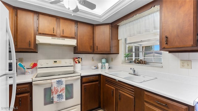 kitchen with sink, decorative backsplash, crown molding, and white appliances