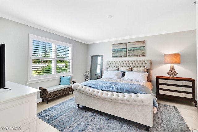 tiled bedroom featuring ornamental molding