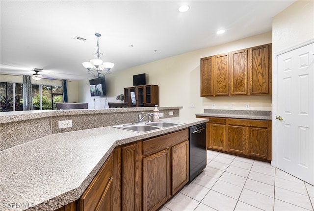 kitchen with ceiling fan with notable chandelier, sink, light tile patterned floors, dishwasher, and a kitchen island