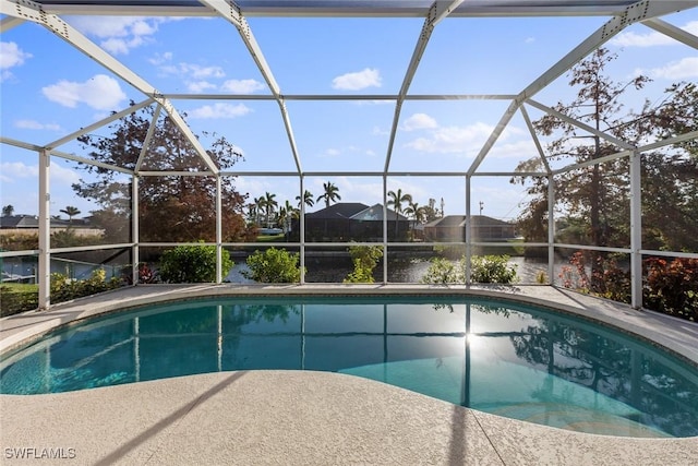 view of pool featuring a lanai