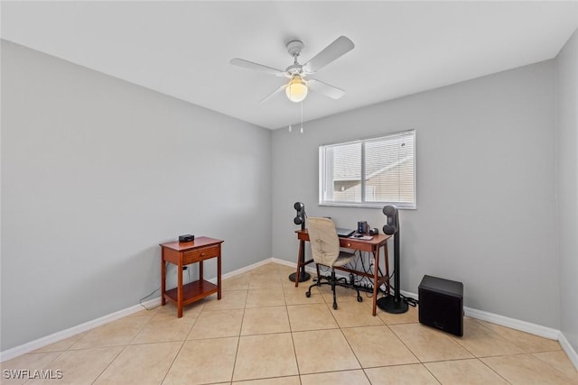 office featuring light tile patterned floors and ceiling fan