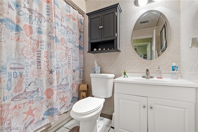 full bathroom featuring toilet, tile walls, and tile patterned floors