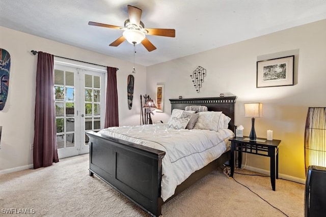 bedroom with ceiling fan, light carpet, and french doors