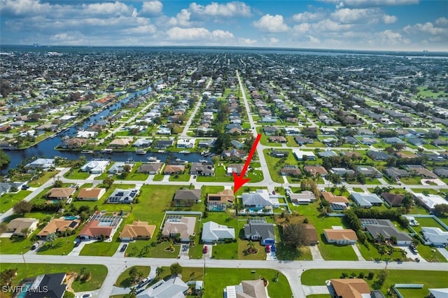 drone / aerial view featuring a water view