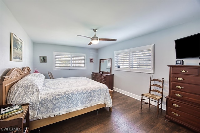 bedroom with dark wood-type flooring and ceiling fan