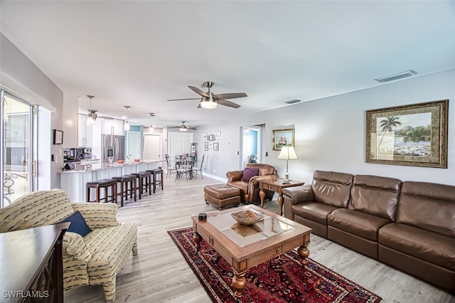 living room featuring light hardwood / wood-style floors