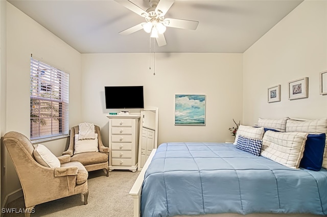 bedroom with ceiling fan and carpet